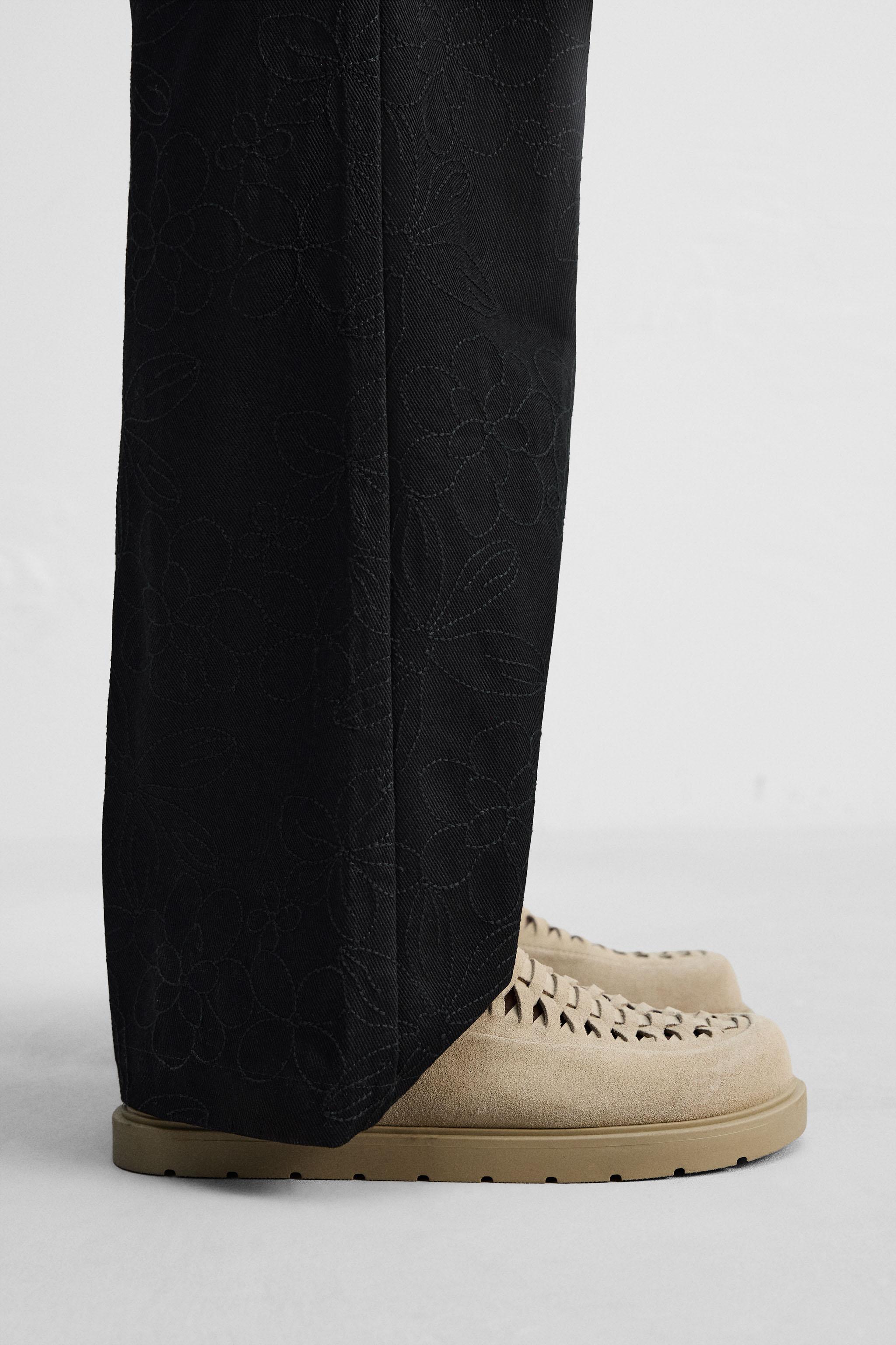 SABOTS EN CUIR TRESSÉ